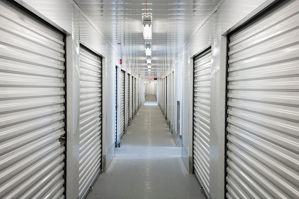 Indoor climate controlled storage complex with monitoring enabled by commercial wireless installations through RFE Communications